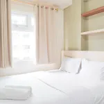 Cozy Stay 1Br At Green Pramuka City Apartment By Travelio